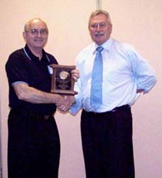 Dan Gosling receiving a special appreciation award from Charles Moore, President of the C.N.A.